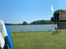 The pool in front of us and plenty of room for all different vans
