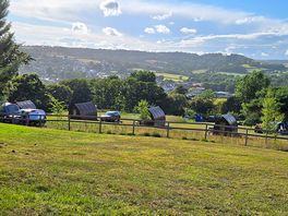 View from the site. it's on a hill but pitches are stepped & flat.
