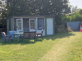A very short walk to the pretty communal kitchen.