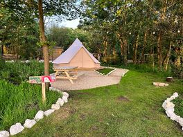Beautiful 5m bell tent with 4 camp beds. Private garden area with picnic table and a small fire pit.