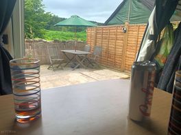Patio area overlooking a broom and bracken for great scenery