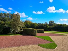 Clean and tidygravelled hard standing.