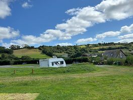 Tent field looking down to touring pitch