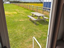 Wooden benches scattered around