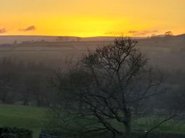 Beautiful sunset over looking the fields.