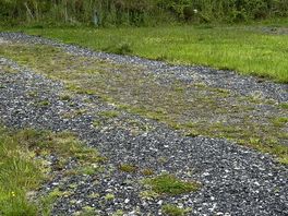 The “hardstanding” area not suitable to walk on if you pitched your awning on here as suggested !