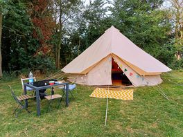 Outside bell tent with seating