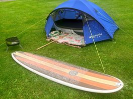 My tent and surfboard, at sunny meadows tourist park