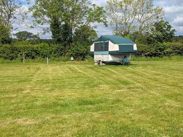 Grass pitches suitable for trailer tents and motorhomes