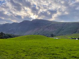 Stunning campsite at the foot of a mountain