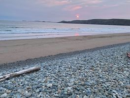 The beach about 100 yards away