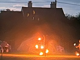 Fire show by campsite owners