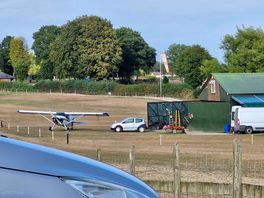 Plane in next field