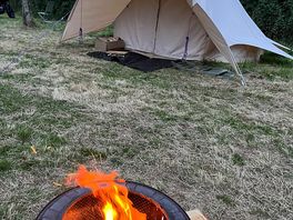 Cracking fire and bell tent.