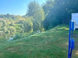 Pitch next to river