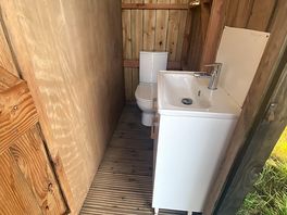 Toilet near pod
