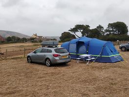 Tent pitched at the bottom of the field pitch where you like