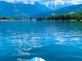 Paddle boarding with a stunning back drop