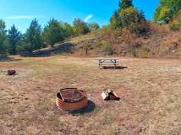 Picnic bench and campfire area