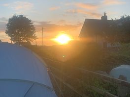 Sunset over the pitch
