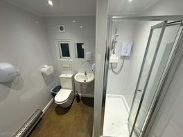 One of the toilet/shower rooms. clean, modern and spacious.