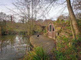 The outside and private balcony of the Lakeside Burrow.
