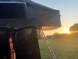 Roof tent and sunset