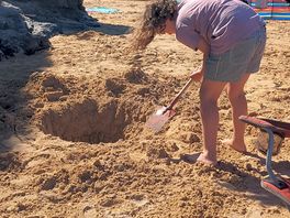 Digging on the beach