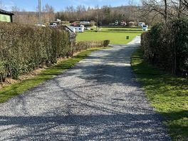 Path to the touring pitches from the toilet block