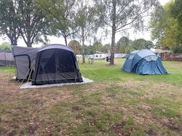 Tents and motor homes have big pitches and cars parked nearby off site once you’ve set up