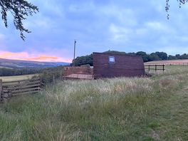 View of pods/site from toilet block on lower level