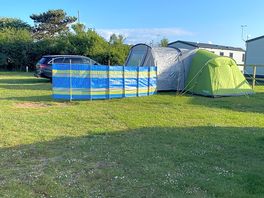 The croft pitch, lovely level pitch next to toilet block with electric hook up