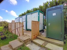 2 x showers, 2 loos and enclosed dish washing facility.