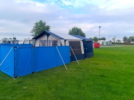 Trailer tent in middle of pitch
