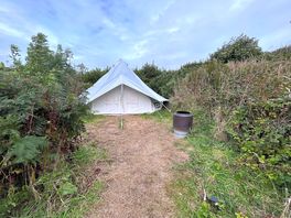 Bell tent hidden away