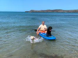 An exciting afternoon paddle boarding and fetching the ball.