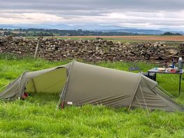 Dry stone wall for shelter if windy, lake district in the distance