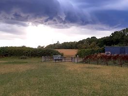 Moody skies, beautiful camping field plenty of space for privacy.