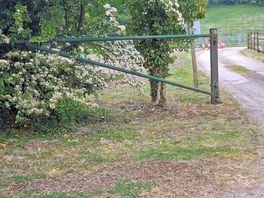 The gate hasn't been moved in a long time.