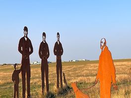 At the top of the white horse are these beautiful figures