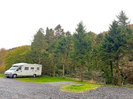 Hardstanding pitch suitable for camper vans and small motorhomes with optional electric.