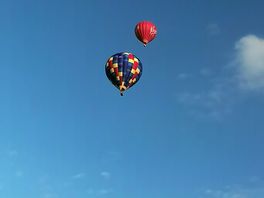 Hot air balloons over the site