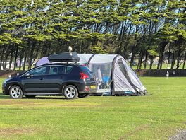 Summer pitch would perfect should put tents round the outside by hedge to protect in bad weather