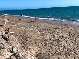 The beach adjacent to the site