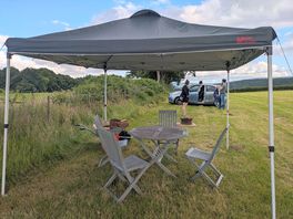 Gazebo with tables and chairs. there was a really effective fire with wood
