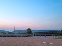 View of horse paddock and coast beyond.