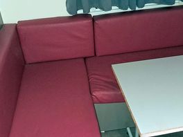 Basic plastic bench seat, dated and uncomfortable