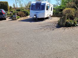 The car even had it's own pitch next to the caravan!
