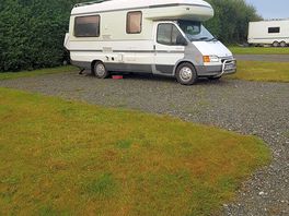 Plenty of room on hard standing and grass area next to it woth awning uo
