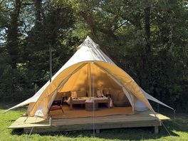 External view of bell tent on decking pad